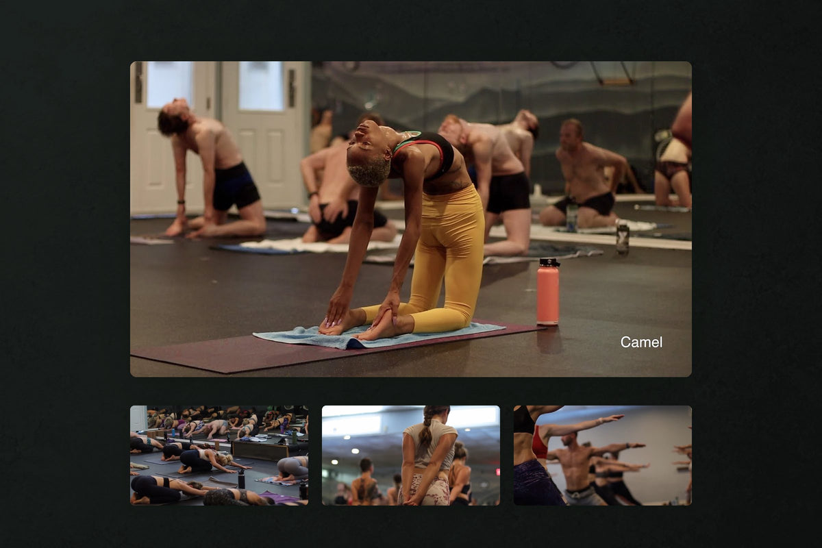 Hot Yoga Asheville promotional film: A practitioner in yellow leggings arches back into camel pose on a mat in a full class, with three smaller stills of the studio