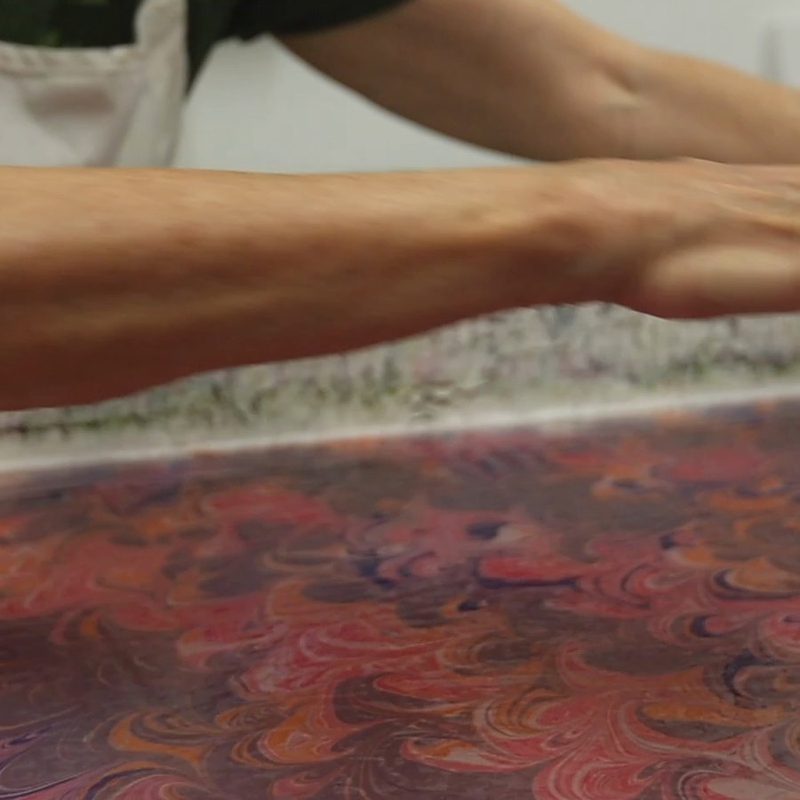 Paper lifted from the bath.